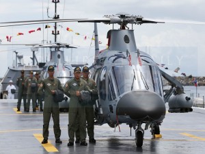 New Augusta Westland attack helicopters are presented at the Philippine Navy headquarters in Manila on August 10, 2015, as two landing vessels are donated by Australia to the Philippines for humanitarian and disaster response operations.