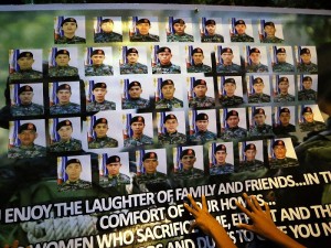 SAF/JAN.29,2015 Pictures of the slain PNP SAF killed in an alleged "misencounter" with MILF and BIFF in Mamasapano,Maguindanao displayed outside the gates of  Camp Bagong Diwa, Taguig. INQUIRER PHOTO/RAFFY LERMA