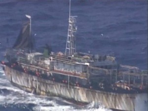 This screen grab of a Monday, March 14, 2016 video released by Argentina's navy, or "Prefectura Naval Argentina" (PNA), shows what they identify as Chinese fishing boat "Lu Yan Yuan Yu 010" in Argentina's national waters off the coast of Puerto Madryn, Argentina. Argentina's navy said in a statement it used gunfire to sink the boat fishing illegally in its waters after its crew didn't heed warning calls and instead tried to ram an Argentine naval vessel. The navy reports all four people on board were rescued and arrested. (Argentina's Navy via AP)