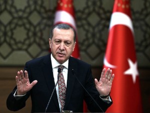 Turkish President Recep Tayyip Erdogan addresses a meeting of local administrators at his palace in Ankara, Turkey, Wedesday, Feb. 10, 2016. Erdogan has ratcheted up his criticism of the United States for not recognizing Syrian Kurdish forces as "terrorists," saying Washington's lack of knowledge of the groups operating in the region had led to bloodshed. Turkey considers the Kurdish Democratic Union Party, or PYD, which are affiliated with Turkey's own Kurdish rebels as a terrorist group.(Yasin Bulbul/Presidential Press Service, Pool via AP)