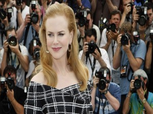 FILE - In this May 25, 2012 file photo, actress Nicole Kidman poses for photographers during a photo call for "Hemingway & Gellhorn" at the 65th international film festival, in Cannes, southern France. Kidman, a first-time Emmy nominee for her lead role in the TV movie, "Hemingway & Gellhorn," said she was raised on "The Brady Bunch" and "Bewitched." (AP Photo/Lionel Cironneau, File)