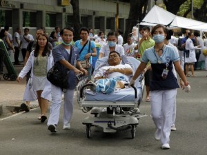 EARTHQUAKE AFTERMATH CEBU/OCTOBER 15,2013: Patients from the Cebu Doctors Hopital are brought outside after a 7.2 magnitude earthquake hitted the Visayas region today.(CDN PHOTO/CHOY ROMANO)