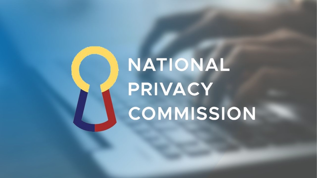 PHOTO: National Privacy Commission logo superimposed over closeup of hand typing on laptop keyboard