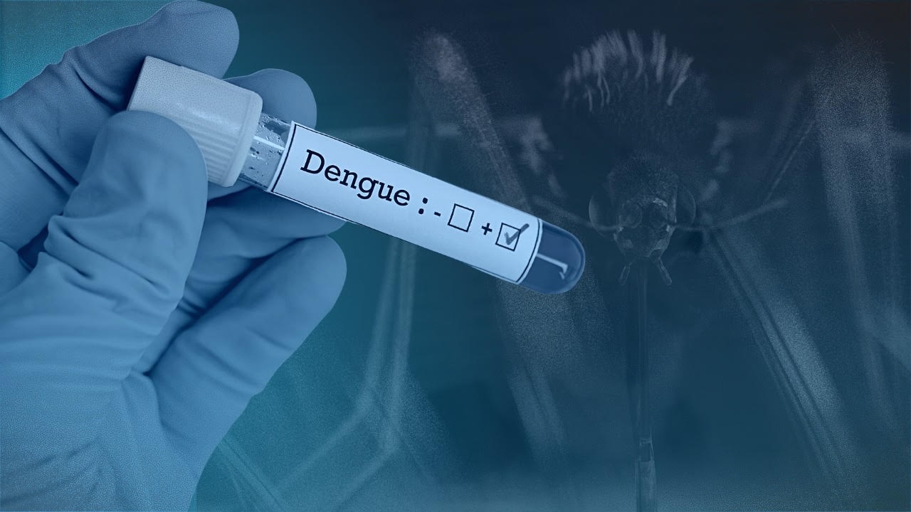 PHOTO: Gloved hand holding test tube labeled DENGUE STORY: Paigtingín ang paglilinis sa mga dengue high-risk areas – Go