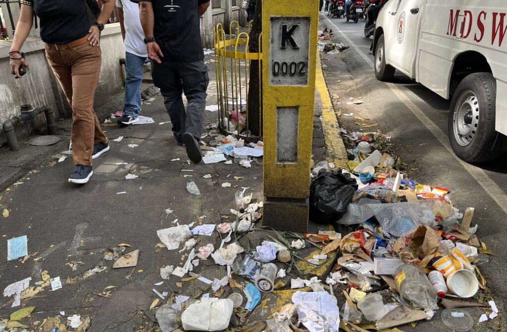 PHOTO: Garbage on sidewalk after Traslacio 2025 FOR STORY: Basura ng Traslacion 2025 sa Maynila umabot sa 382 metric tons